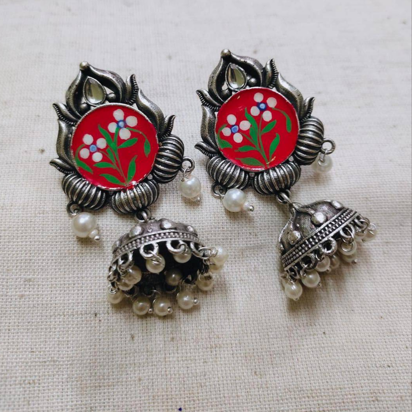 Enchanting Silver Brass Oxidized Enamel Hand painted Jhumka earrings