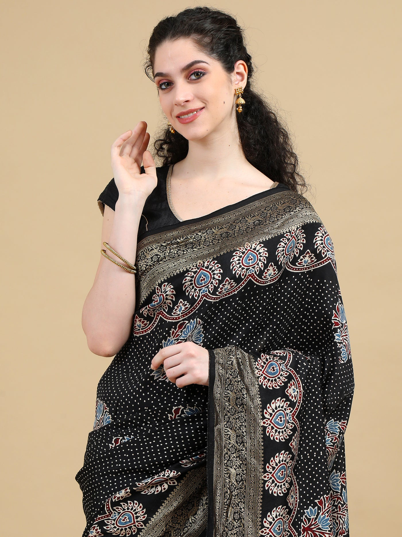 Ajrak Dola Silk Saree with Dotted Black Base, Floral Motifs, and Intricate Paisley Border