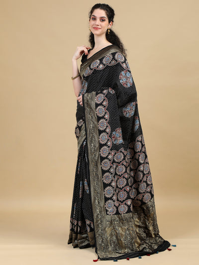 Ajrak Dola Silk Saree with Dotted Black Base, Floral Motifs, and Intricate Paisley Border