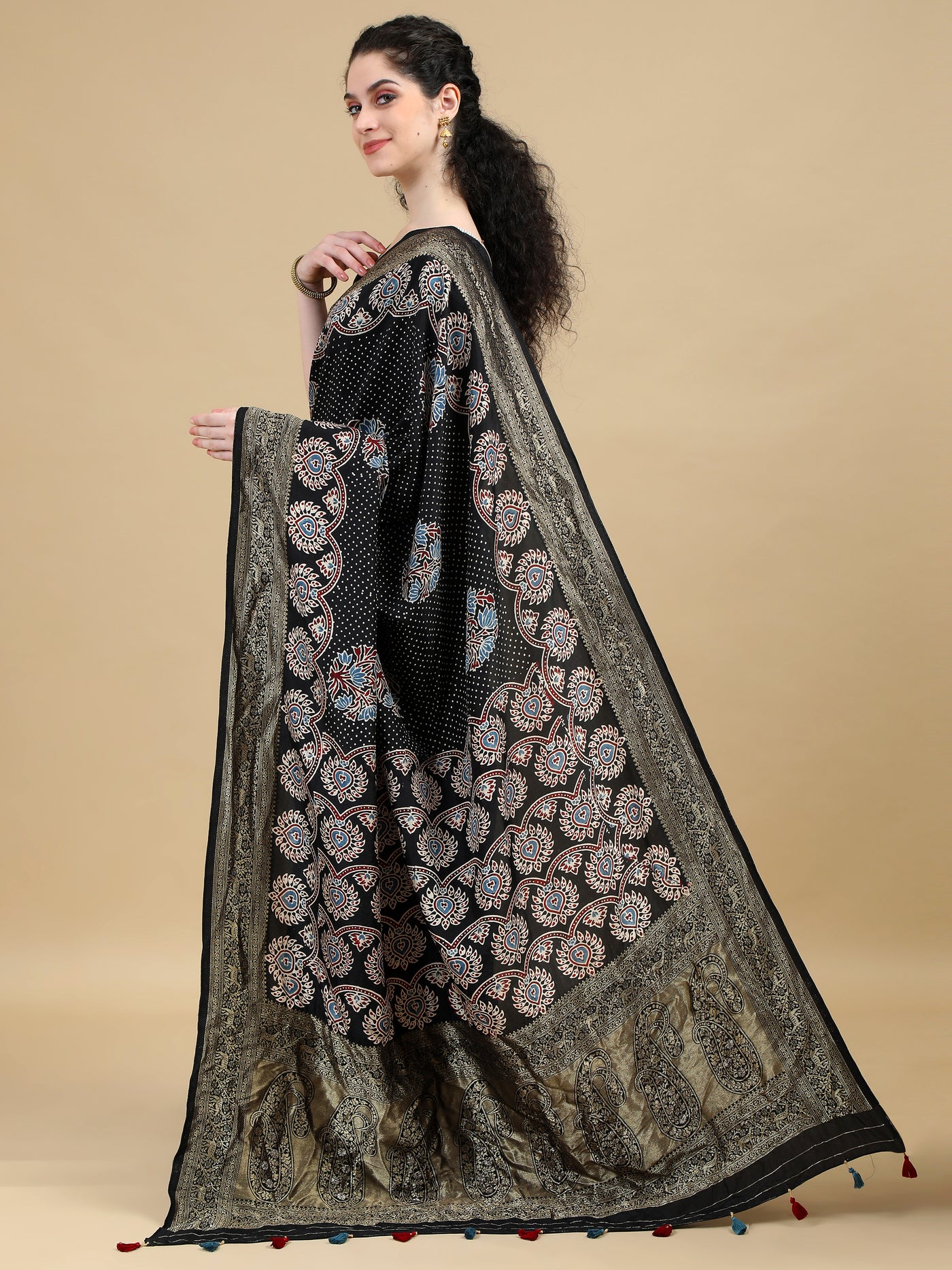 Ajrak Dola Silk Saree with Dotted Black Base, Floral Motifs, and Intricate Paisley Border