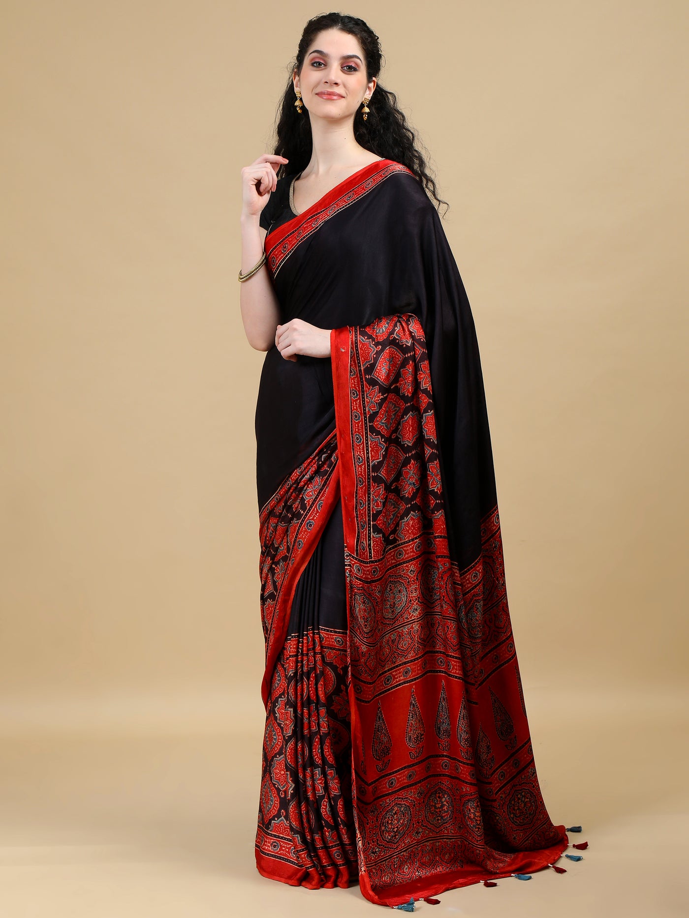 Black & Red Ajrak Modal Silk Saree with Ornate Red Borders