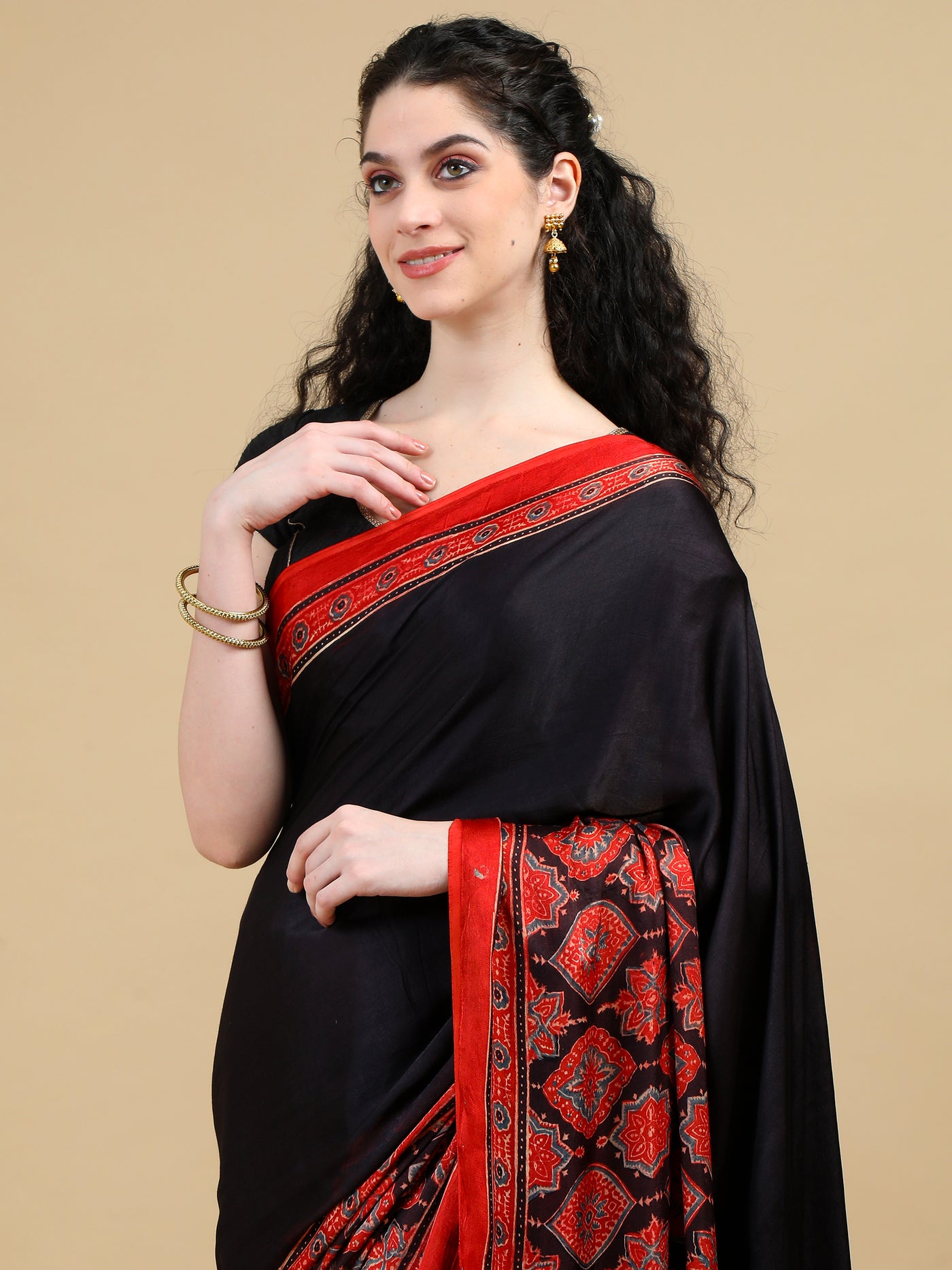 Black & Red Ajrak Modal Silk Saree with Ornate Red Borders