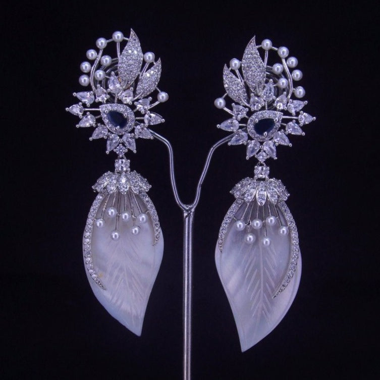 Blue Centerpiece: White Diamond CZ Statement Earrings with Silver Pearl