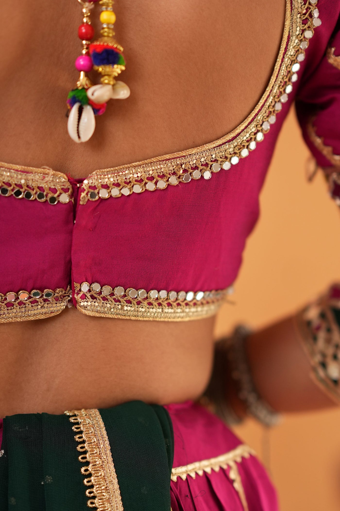 Magenta Navratri Chaniya Choli with Green Dupatta