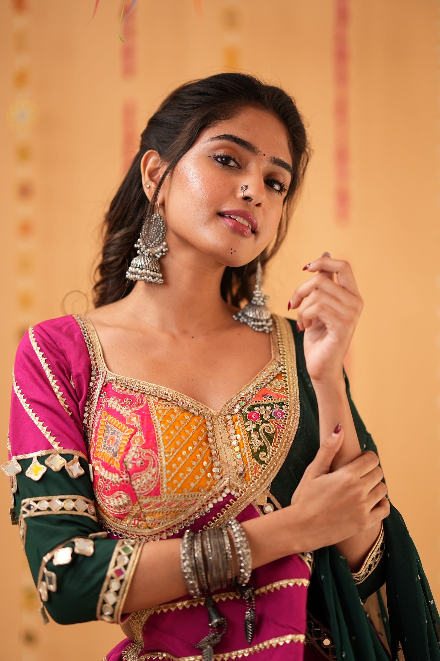 Magenta Navratri Chaniya Choli with Green Dupatta