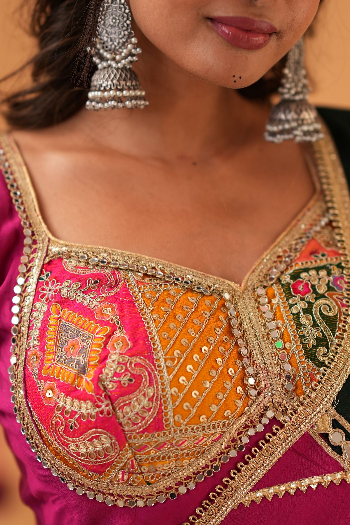 Magenta Navratri Chaniya Choli with Green Dupatta