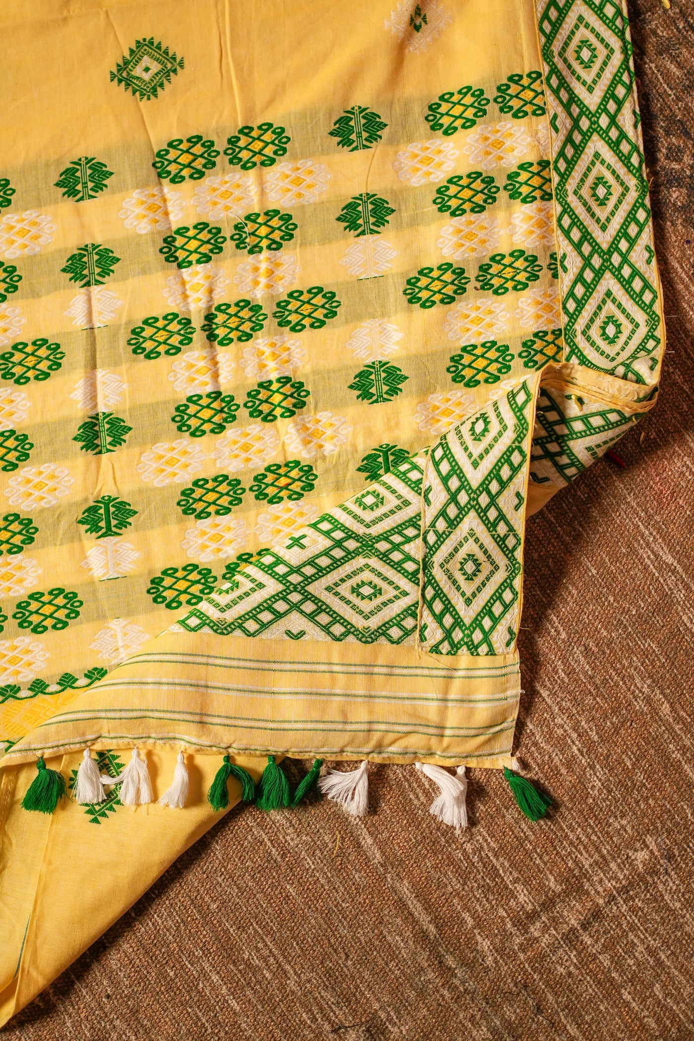 Bright Yellow Assam Cotton Handloom Saree – Mishing Tribe Weave with Traditional Seven Sisters (Saat Bhoni) Design